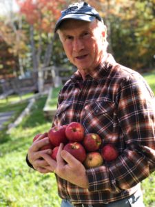 Steve holding Apples