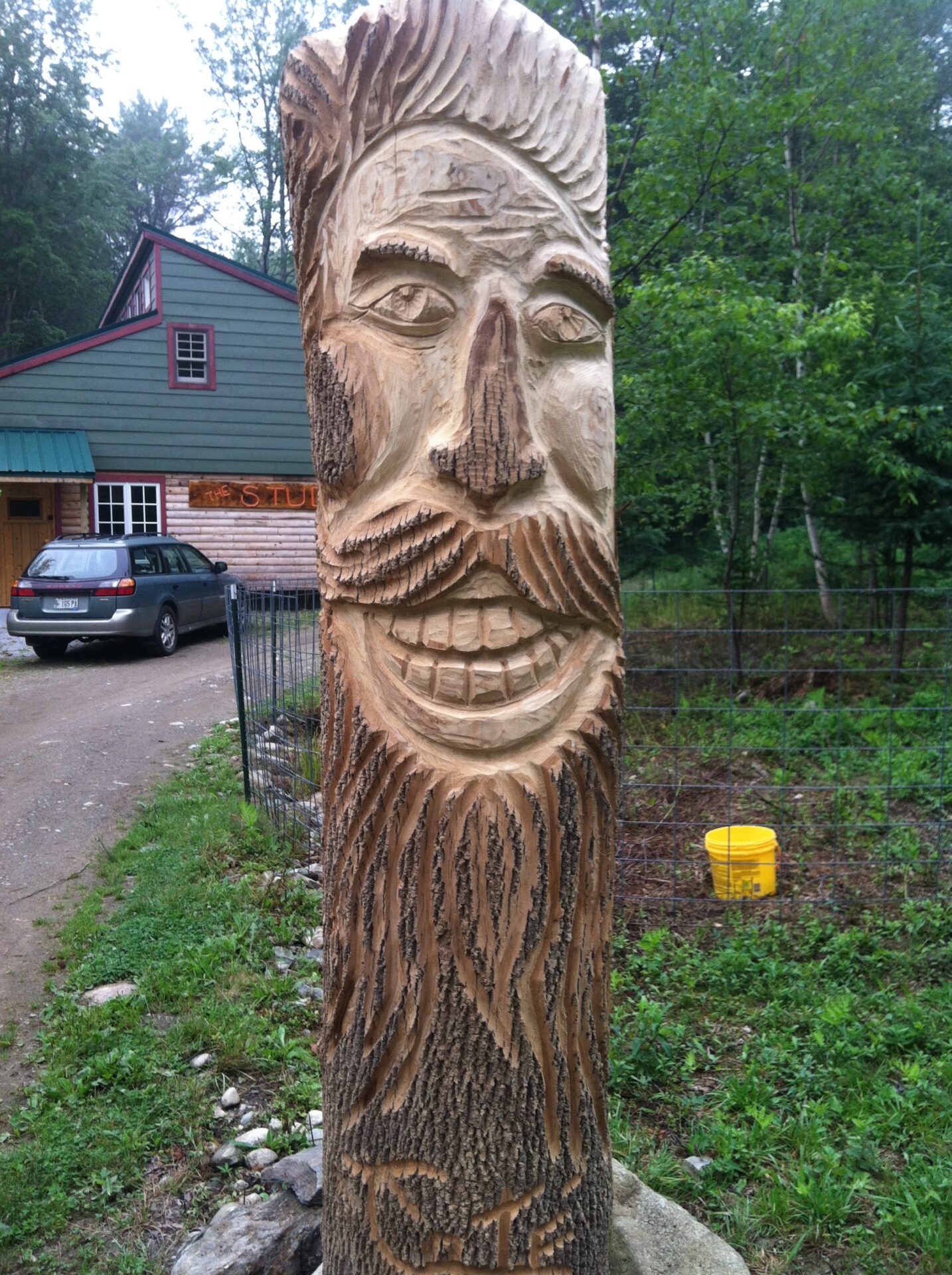 Artist in Residnece Tom Cote carved a totem for the entrance of the art studio...looks like a happy French Canadian don't you think?