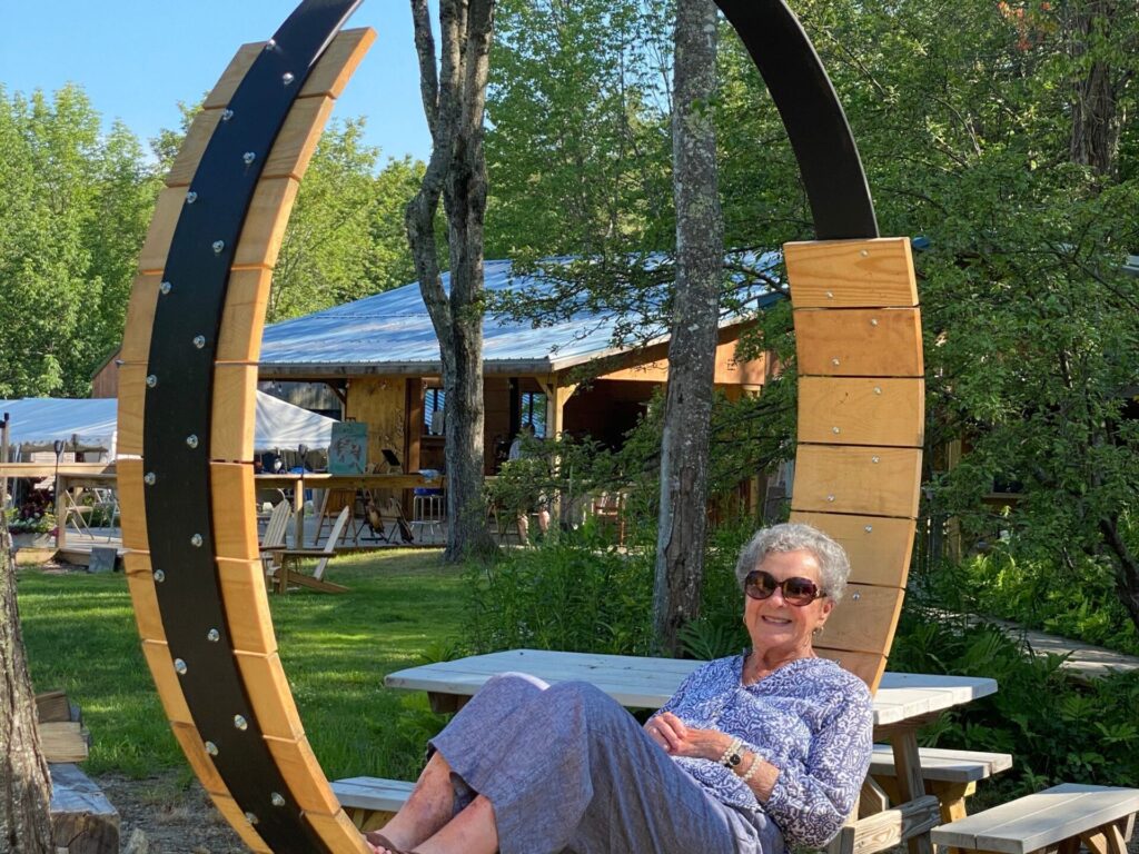 woman relaxing in a circle swing