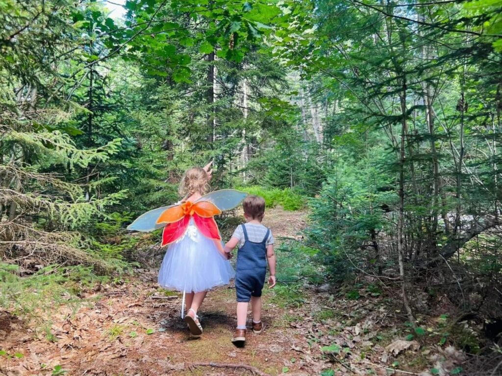 two children walking the fairy trail in blue hill